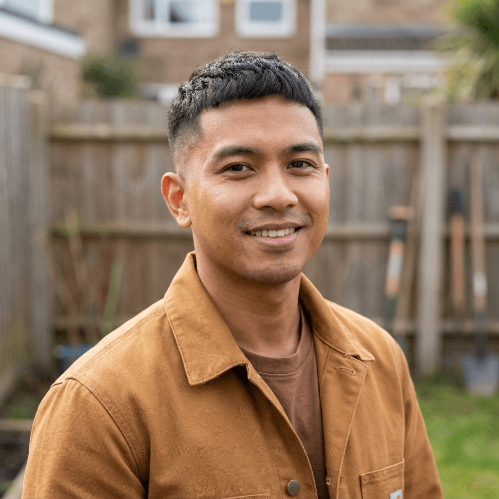 Marcus Chen, male office manager in his 40s, East Asian, professional appearance